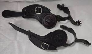 lot 1103 image: Pair of Western Horse Spurs with Black Leather Straps - Retail $0