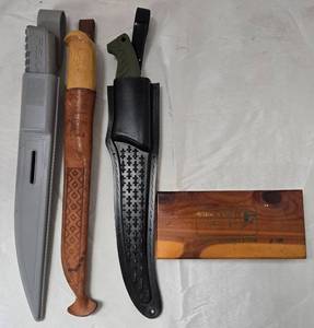 lot 1114 image: (3) Filet Knives  with Sharpening Stone and Sheaths - Retail $0