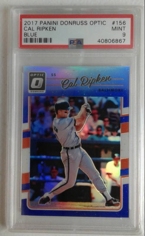 lot 1031 image: MINT PSA 9 2017 Optic Cal Ripken Jr Blue Prizm Insert #133149 Baltimore Orioles Professionally Graded