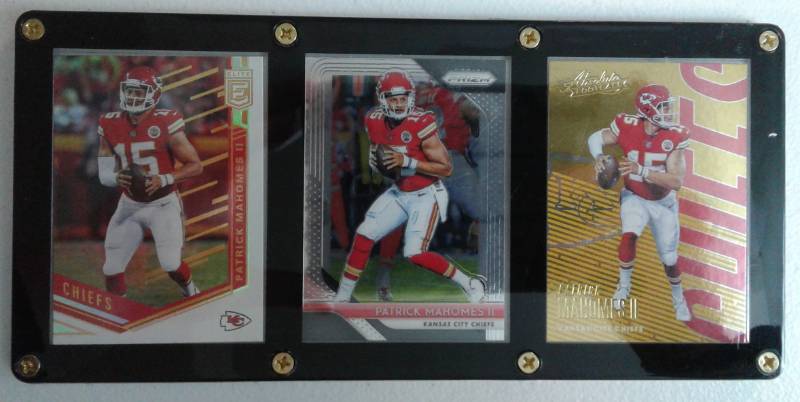 lot 1055 image: Patrick Mahomes II Three Card Acrylic Screwdown Kansas City Chiefs Football Cards - Elite - Prizm - Absolute
