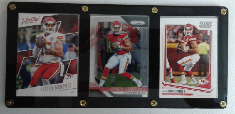 lot 1056 image: Patrick Mahomes II Three Card Acrylic Screwdown Kansas City Chiefs Football Cards - Prestige - Prizm - Score