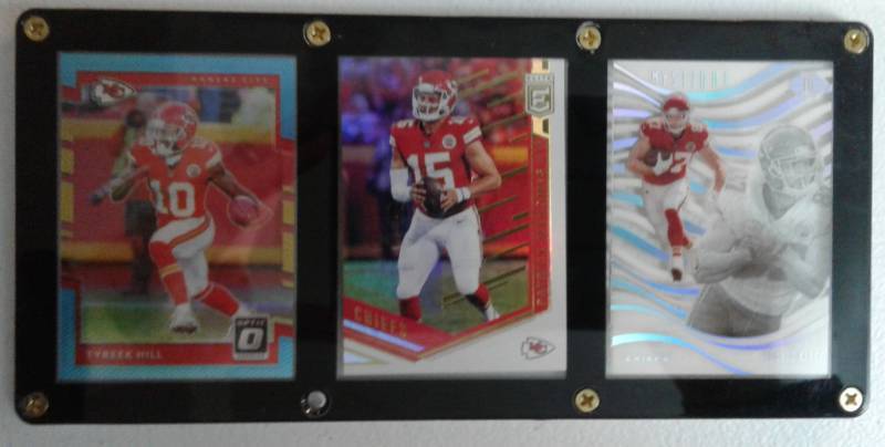 lot 1059 image: Patrick Mahomes II Tyreek Hill Travis Kelce Three Card Acrylic Screwdown Kansas City Chiefs Football Cards