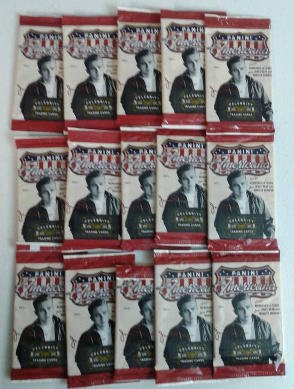 lot 1060 image: Lot of Fifteen Sealed Packs of 2011 Panini Americana With Possible Relics & Autographs - James Dean & Marilyn Monroe Possible