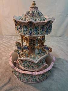 lot 25 image: Decorative Carousel Music Box with Wisteria Vine Design