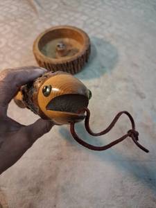 lot 37 image: Wooden Fish Lure with Bark-Textured Body and Braided Cord Tail