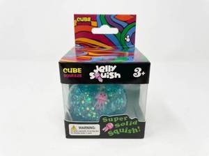 lot 95 image: Cube Squeeze Jelly Squish Blue Glitter Jellyfish Squeeze Toy Ages 3