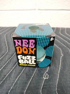 lot 107 image: Needon Fuzz Ball Flower Power Velvet Squeeze Toy Ball in Box
