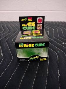 lot 153 image: NeeDoh Nice Cube Apple Squishy Toy Green by Schylling