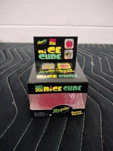 lot 154 image: NeeDoh Nice Cube Apple Squishy Toy Pink by Schylling