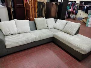 lot 1015 image: L-Shaped Sectional Sofa w Chaise, Gray Fabric Base & Ribbed Cream Cushions