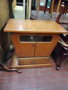 lot 1062 image: Munari Wood Swivel-Top Cabinet w Glass Doors and Drawer