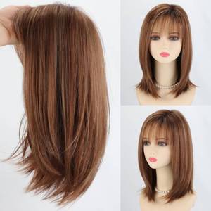 lot 8346 image: RENERSHOW Layered Bob Wig with Bangs 14 Inch Strawberry Blonde