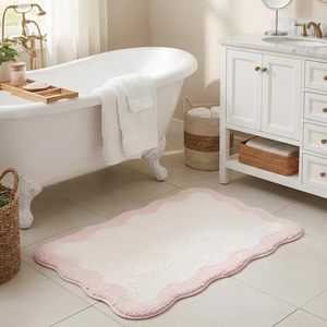 lot 8205 image: Granny Says Pink Scalloped Bath Rug 32 x 20 in