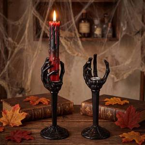 lot 13576 image: Qinyoung Halloween Skull Taper Candle Holders Skeleton Hands 2 Pack Black
