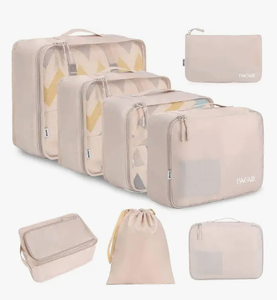 lot 2947 image: Bagail Beige Zippered mesh bag with multiple small mesh bags tan