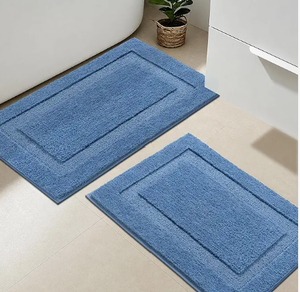 lot 1403 image: Blue Plush Microfiber Bath Rugs Set of 2 Folded Stack