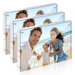 lot 2265 image: Upsimples Magnetic Floating Acrylic Picture Frame 5x7 3 Pack