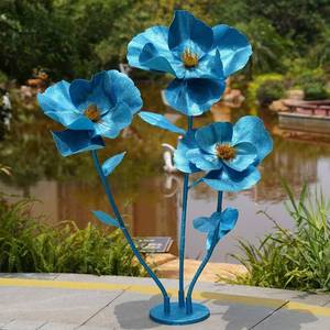 lot 7482 image: ZEYEXE Giant Glitter Artificial Flowers 3 Pcs Blue EVA With Stand  Retail $119