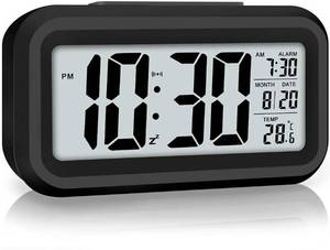 lot 14415 image: Jisile Digital Alarm Clock with Night Light, 4.5 LCD Display, Battery Operated