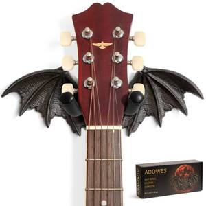 lot 17913 image: Adowes Bat Wing Guitar Wall Mount Cast Iron Hanger Black
