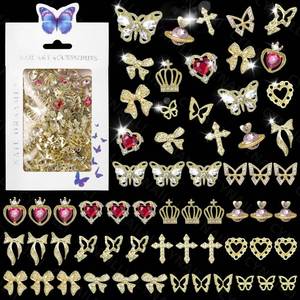 lot 18037 image: Cynailli Gold Nail Charms and Gems 110 Pcs Alloy 3D Butterfly Heart Cross Bow
