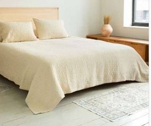 lot 12563 image: Avacodo Cream Textured Quilted Bedspread with Two Matching Pillow Shams