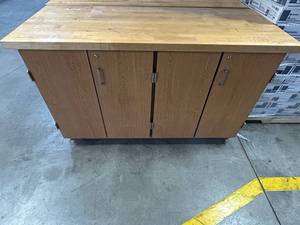 lot 16559 image: 4-Door Storage Cabinet with Shelving and Wood Top