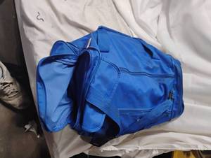 lot 2356 image: Small Blue Bag full of books