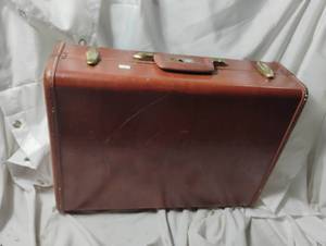 lot 2357 image: Brown Suit case Full of movies