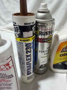 lot 2190 image: Misc wood Caulk and Lawn care