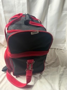 lot 2147 image: Black and Red bag full of movies