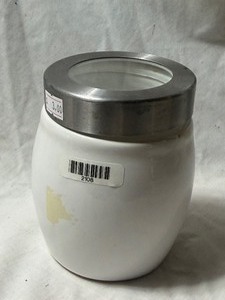 lot 2108 image: White jar with see through lid with circle makeup wipes