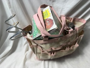 lot 2123 image: Misc Pink bag of lawn care