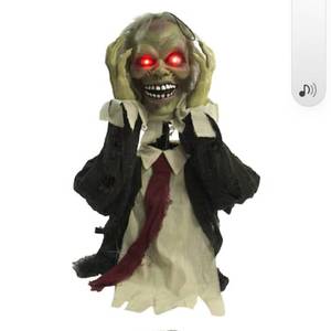 lot 9256 image: Haunted Hill Farm Scary Groundbreaker Zombie Animatronic with Touch Activated Lights and Sound, Indoor or Covered Outdoor Halloween Decorations, Battery Operated Halloween Props - Retail $50