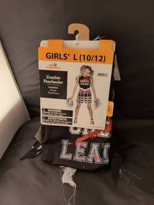 Zombie Fearleader Girls' L (10/12) Costume Dress with Pom-Poms retails for $21.68