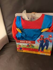 lot 17 image: NIB Super Mario Kids M (8) Jumpsuit Costume with Hat and Mustache retails $34.95