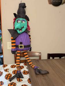 lot 82 image: Witch Halloween Decoration Figure with Orange Black Striped Stockings