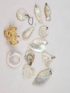 lot 165 image: Lot of Carved Shell Pendants and Charms Shell Ring and Celluloid Brooch