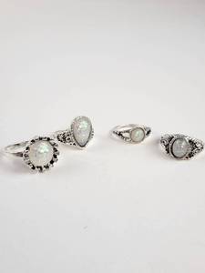 lot 214 image: Set of 4 Rings with Ornate Metalwork