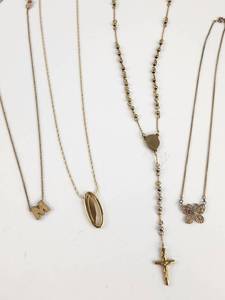 lot 219 image: Lot of 4 Gold Tone Pendant Necklaces with Butterfly Cross Oval Letter Charms