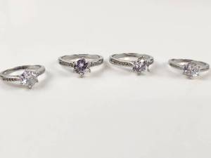 lot 240 image: 4 Silver Tone Rings