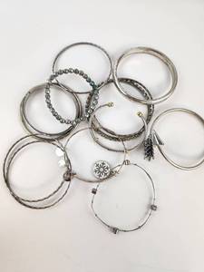 lot 249 image: Lot of Silver-Tone Bracelets with Beads and Charms