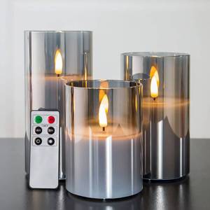 lot 1980 image: Eywamage Smoke Grey Glass Flameless Pillar Candles with Remote, Flickering LED Battery Candles Table Decor Set of 3 - Retail $36