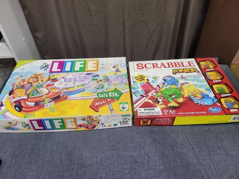 lot 566 image: The Game of Life and Scrabble Junior Board Games Lot