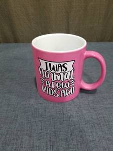 lot 1037 image: Pink Ceramic Mug I Was Normal A Few Kids Ago