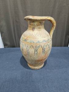 lot 1049 image: Decorative Ceramic Pitcher with Incised Figures and Geometric Patterns