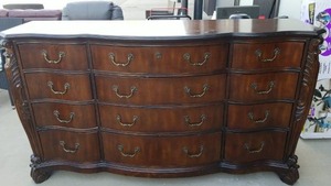 lot 24 image: Pulaski 12-Drawer Dresser with Curved Front and Metal Hardware