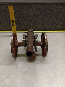 lot 3032 image: Miniature Cannon Model with Two Wheels and Wood Base