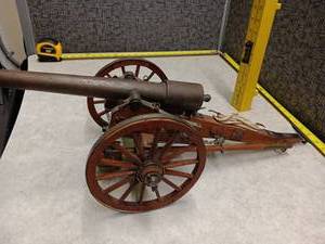 lot 3032 image: Miniature Cannon Model with Two Wheels and Wood Base