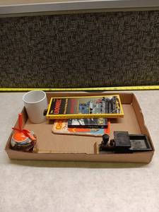 lot 3219 image: Railroad Collectibles Lot Union Pacific Mug, Lionel Guide, Train Books, Spike